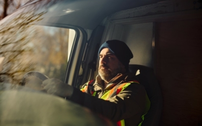 HGV driver driving alone.